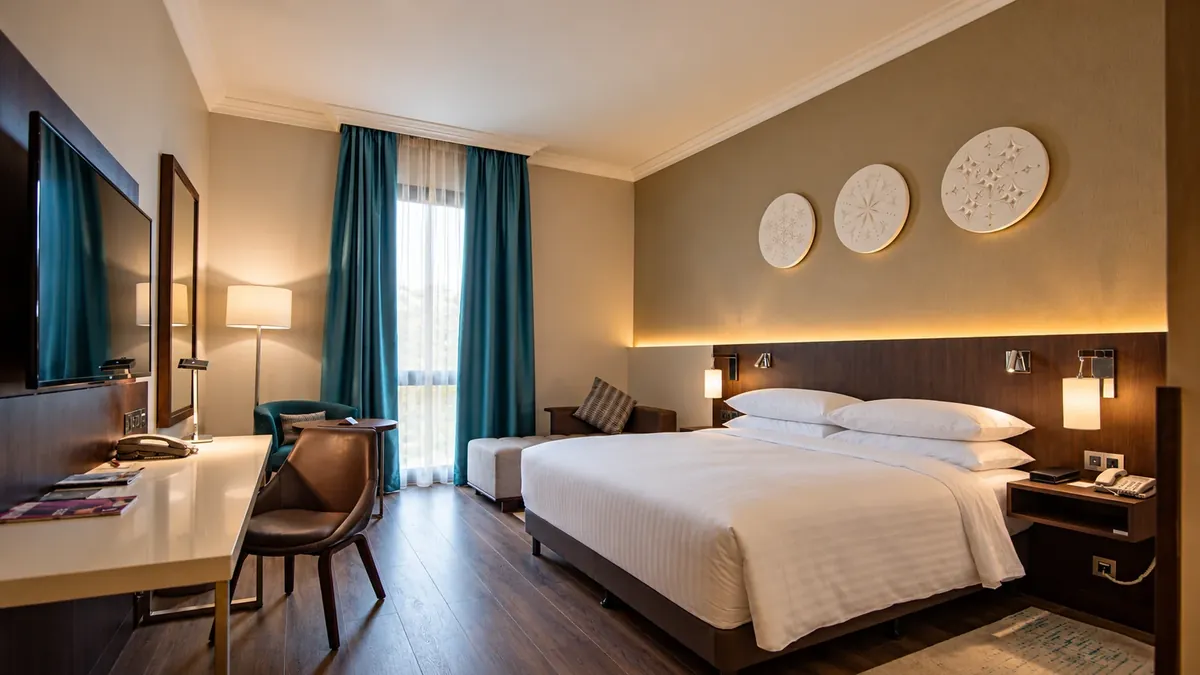 Marriott Airport Hotel Riyadh — guest room after the ASAS fit-out